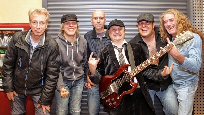 Foto: AC/DC, ein Synonym für Härte, rohe Gitarrenriffs und eingängige Songs von ungeheurer Energie.